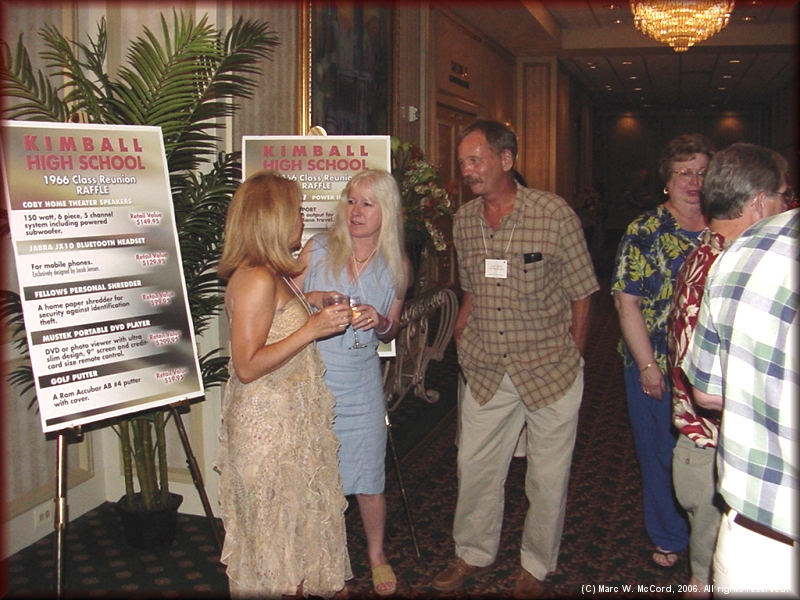 Patricia Massey talking with Cindy (Morgan) and Greg Vincent in the hallway outside the banquet room