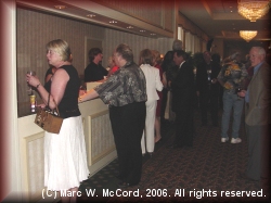 The registration desk was a busy place on Saturday night