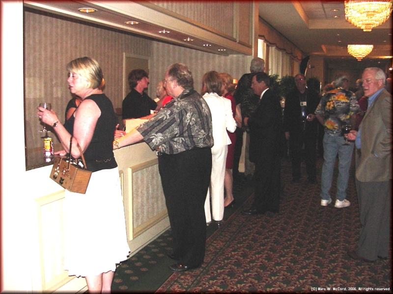 The registration desk was a busy place on Saturday night