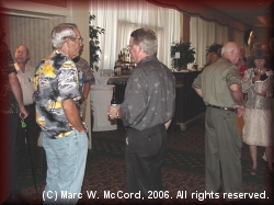 Mike Brinkley and Robert Nelson talking outside the banquet room