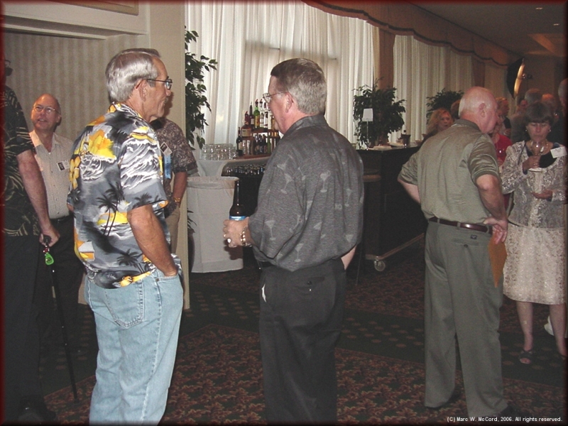 Mike Brinkley and Robert Nelson talking outside the banquet room