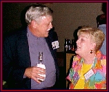 George Flynn chatting with Mrs. Thompson at the 35th Reunion, July 7, 2001
