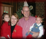 Jim and Florence with two grandchildren