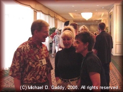 Jim and Patsy Bracy talking with Betty Garvin Garton outside the banquet hall