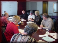 Pam Hare Bazet discussing entertainment at the February Planning Meeting