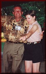Gary Tatom and Denise Goff cutting a rug at the 35th Reunion picnic, 2001